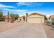 Single story home with desert landscaping and two car garage at 17014 E De Anza Dr, Fountain Hills, AZ 85268