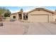 House exterior, two-car garage and desert landscaping at 17014 E De Anza Dr, Fountain Hills, AZ 85268