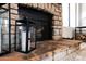 Stone fireplace with black metal lanterns at 17014 E De Anza Dr, Fountain Hills, AZ 85268