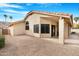 Tan stucco house with a covered patio and gravel landscaping at 17014 E De Anza Dr, Fountain Hills, AZ 85268