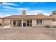 Rear view of house showcasing tile roof and patio at 17014 E De Anza Dr, Fountain Hills, AZ 85268