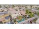 Aerial view showing house, pool, and surrounding neighborhood at 1715 W Satinwood Dr, Phoenix, AZ 85045