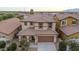 Two-story house, brown tile roof, and a two-car garage at 1715 W Satinwood Dr, Phoenix, AZ 85045