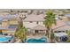 Aerial view of house with pool and landscaped backyard at 1715 W Satinwood Dr, Phoenix, AZ 85045