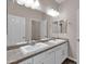 Double vanity bathroom with a large mirror at 1715 W Satinwood Dr, Phoenix, AZ 85045