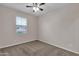 Bright bedroom with carpet, ceiling fan and window at 1715 W Satinwood Dr, Phoenix, AZ 85045