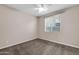 Bright bedroom featuring ceiling fan and window blinds at 1715 W Satinwood Dr, Phoenix, AZ 85045