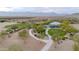 Aerial view of a community park with playground, shaded seating, and walking paths at 1715 W Satinwood Dr, Phoenix, AZ 85045