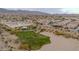 Aerial view of community, park, and surrounding landscape at 1715 W Satinwood Dr, Phoenix, AZ 85045