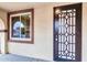 Front entry with decorative door and sidelight window at 1715 W Satinwood Dr, Phoenix, AZ 85045