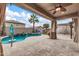 Inviting backyard oasis with a pool, patio furniture, and a pergola at 1715 W Satinwood Dr, Phoenix, AZ 85045