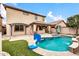 Inviting backyard pool with a pergola and grassy area at 1715 W Satinwood Dr, Phoenix, AZ 85045