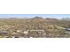 Aerial view showing distant mountain range and suburban neighborhood at 17243 N 16Th St # 1, Phoenix, AZ 85022