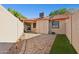 Private backyard with brick pavers and small grass area at 17243 N 16Th St # 1, Phoenix, AZ 85022