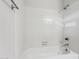 Clean bathroom with white tiled shower/tub combo at 17243 N 16Th St # 1, Phoenix, AZ 85022