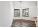 Simple dining room with wood-look flooring and neutral walls at 17243 N 16Th St # 1, Phoenix, AZ 85022