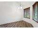 Charming dining room with wood-look flooring and large windows at 17243 N 16Th St # 1, Phoenix, AZ 85022