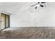 Bright living room with a ceiling fan and sliding glass doors at 17243 N 16Th St # 1, Phoenix, AZ 85022