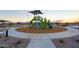 Community playground with swings and climbing structures at 17299 W Dahlia Dr, Surprise, AZ 85388