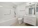 Bathroom with tub, toilet, and vanity at 17635 N Buntline Dr, Sun City West, AZ 85375