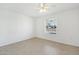 Bright bedroom with ceiling fan and window at 17635 N Buntline Dr, Sun City West, AZ 85375