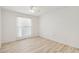 Well-lit bedroom with ceiling fan and window at 17635 N Buntline Dr, Sun City West, AZ 85375