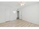 Spacious bedroom featuring light walls and laminate floors at 17635 N Buntline Dr, Sun City West, AZ 85375