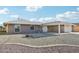 Ranch style home with a covered entryway and gravel landscaping at 17635 N Buntline Dr, Sun City West, AZ 85375