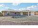 House exterior with a pergola and attached garage at 17635 N Buntline Dr, Sun City West, AZ 85375