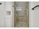 Updated shower with glass enclosure and shelves at 17635 N Buntline Dr, Sun City West, AZ 85375