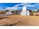 A fenced backyard includes low maintenance landscaping and patio perfect for outdoor entertaining at 1839 E Indigo St, Mesa, AZ 85203