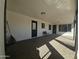 Covered patio with brick pavers and a bench at 1839 E Indigo St, Mesa, AZ 85203