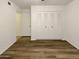 Bedroom with double door closet and vinyl flooring at 19002 N 47Th Dr, Glendale, AZ 85308