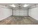 Spacious garage with overhead storage and an automatic garage door at 19002 N 47Th Dr, Glendale, AZ 85308