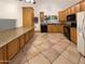 Spacious kitchen with ample cabinetry and granite countertops at 19002 N 47Th Dr, Glendale, AZ 85308