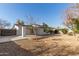 Home exterior showcasing a large backyard at 19819 N 6Th Dr, Phoenix, AZ 85027