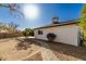 Brick pathway leads to a cozy backyard at 19819 N 6Th Dr, Phoenix, AZ 85027