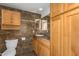 Bathroom with wood cabinets and tile flooring at 19819 N 6Th Dr, Phoenix, AZ 85027