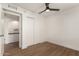 Bedroom with ceiling fan and built-in closet at 19819 N 6Th Dr, Phoenix, AZ 85027