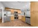 Bright kitchen featuring stainless steel appliances and light wood cabinets at 19819 N 6Th Dr, Phoenix, AZ 85027