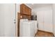 Laundry room with washer, dryer, and cabinets at 19819 N 6Th Dr, Phoenix, AZ 85027