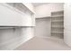 Large walk-in closet with ample shelving and hanging space at 20359 N 262Nd Dr, Buckeye, AZ 85396