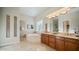 Elegant bathroom with soaking tub and double vanity at 211 E Desert Wind Dr, Phoenix, AZ 85048