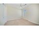 Bright bedroom with neutral carpeting and plantation shutters at 211 E Desert Wind Dr, Phoenix, AZ 85048