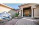 A tiled fountain and walkway welcome guests to the home's entrance at 211 E Desert Wind Dr, Phoenix, AZ 85048