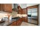 Well-equipped kitchen with gas cooktop and ample cabinetry at 211 E Desert Wind Dr, Phoenix, AZ 85048