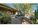 Large patio area with a stone walkway leading to the backyard at 211 E Desert Wind Dr, Phoenix, AZ 85048