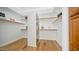 Large walk-in closet with ample shelving and storage at 211 E Desert Wind Dr, Phoenix, AZ 85048