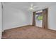 Bright bedroom featuring neutral wall and carpet colors at 2130 E San Juan Ave, Phoenix, AZ 85016