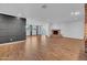 Bright living room with hardwood floors and corner fireplace at 2130 E San Juan Ave, Phoenix, AZ 85016